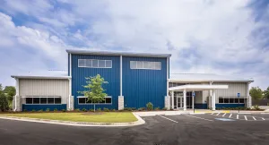 Blue pre-engineered building used as a training facility for Plumbers and Steam Fitters Union of the CSRA-Local 150