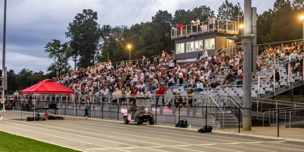 spectators in stadium seats